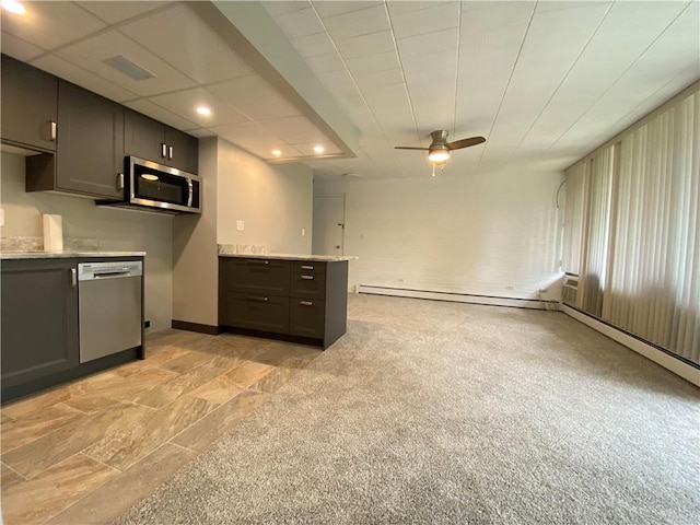 446 Hoodridge Dr Unit 210, Castle Shannon, PA 15234 - kitchen featuring appliances with stainless steel finishes, a ceiling fan, light stone finish flooring, a peninsula, and recessed lighting