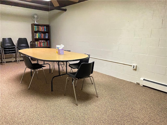 446 Hoodridge Dr Unit 210, Castle Shannon, PA 15234 - carpeted dining space with baseboard heating and concrete block wall