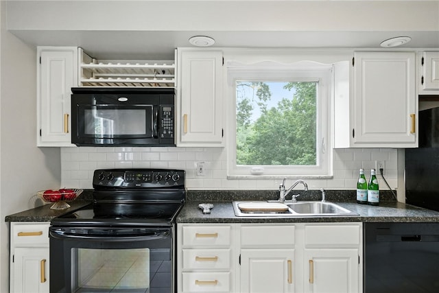 717 Kewanna Ave, Mt Lebanon, PA 15234 - kitchen with black appliances, dark countertops, white cabinetry, and backsplash