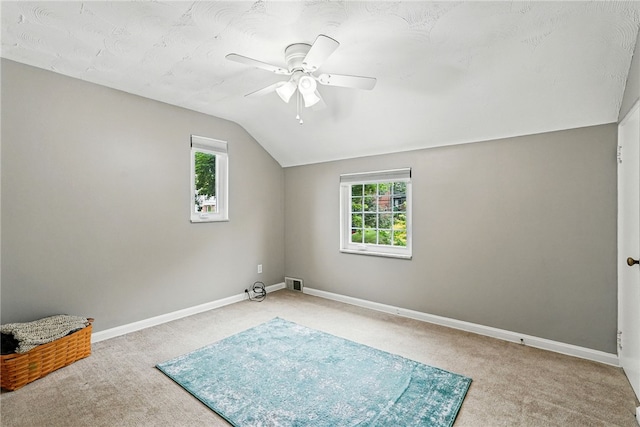 717 Kewanna Ave, Mt Lebanon, PA 15234 - carpeted empty room with vaulted ceiling, healthy amount of natural light, and a ceiling fan