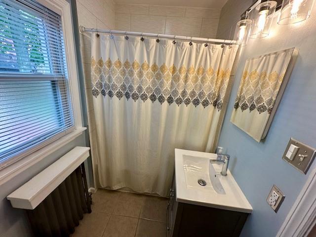 111 Race St, Regent Square, PA 15218 - full bath featuring radiator, vanity, and tile patterned flooring