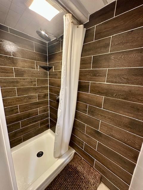 111 Race St, Regent Square, PA 15218 - bathroom featuring a stall shower and wooden walls