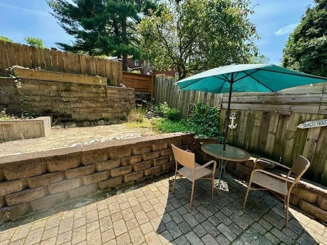 111 Race St, Regent Square, PA 15218 - fenced backyard with a patio area and outdoor dining area