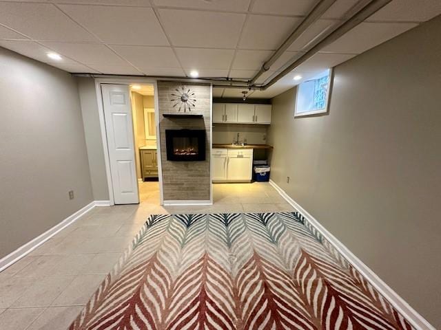 111 Race St, Edgewood, PA 15218 - below grade area with a fireplace, light tile patterned floors, and recessed lighting