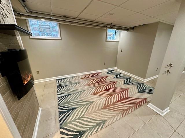 111 Race St, Edgewood, PA 15218 - below grade area featuring tile patterned floors and a drop ceiling