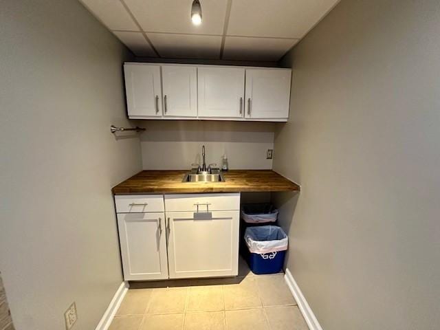 111 Race St, Edgewood, PA 15218 - bar with light tile patterned floors and a paneled ceiling