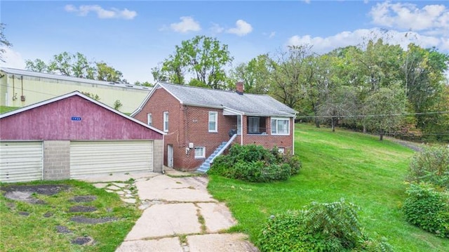 1920 Renton Rd, Plum Boro, PA 15239 - view of front facade featuring concrete driveway, brick siding, a front lawn, a chimney, and an outdoor structure
