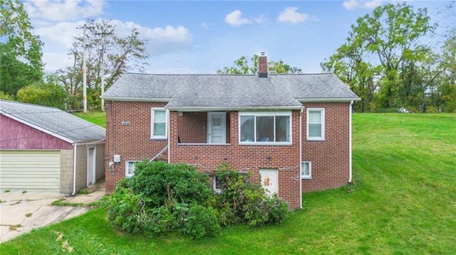 1920 Renton Rd, Plum Boro, PA 15239 - view of front of house featuring brick siding, a chimney, a front yard, and concrete driveway
