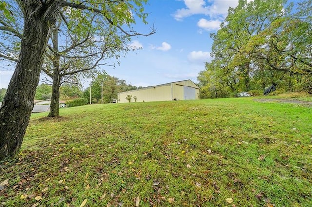 1920 Renton Rd, Plum Boro, PA 15239 - view of grassy yard featuring a pole building and an outdoor structure