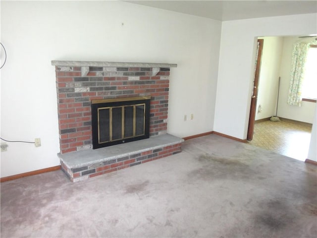 110 Raymond Ave, Luzerne Twp, PA 15417 - unfurnished living room featuring a fireplace and carpet