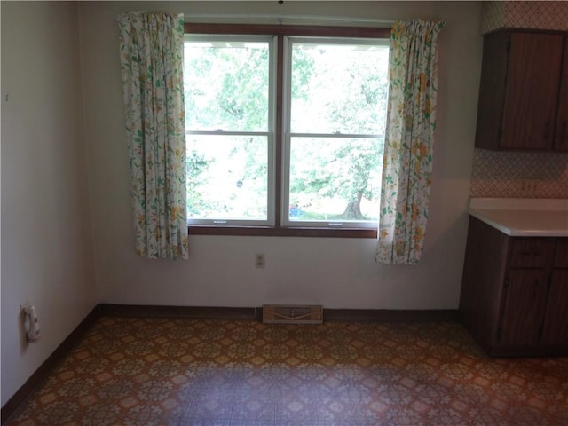 110 Raymond Ave, Luzerne Twp, PA 15417 - unfurnished dining area with healthy amount of natural light and light floors
