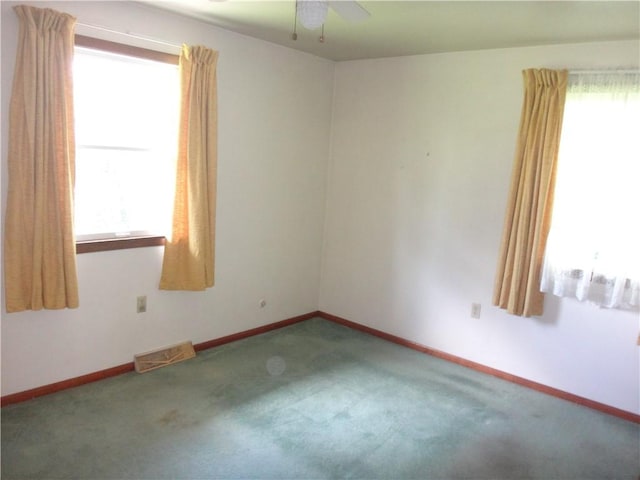 110 Raymond Ave, Luzerne Twp, PA 15417 - carpeted empty room with plenty of natural light and ceiling fan