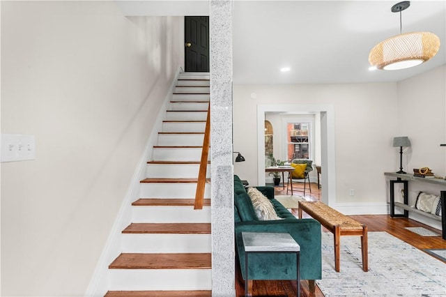 927 Greenfield Ave, Greenfield, PA 15217 - staircase with wood finished floors and recessed lighting