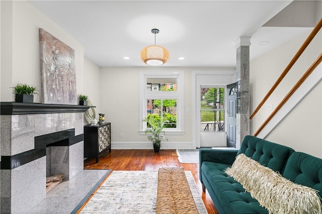 927 Greenfield Ave, Greenfield, PA 15217 - living area featuring wood finished floors, a fireplace, and recessed lighting