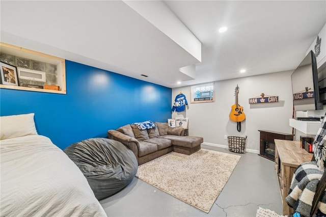 425 Sandy Dr, Shaler, PA 15116 - living room featuring concrete floors, recessed lighting, and a glass covered fireplace