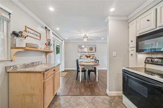 425 Sandy Dr, Shaler, PA 15116 - kitchen with range with electric stovetop, black microwave, open shelves, crown molding, and recessed lighting