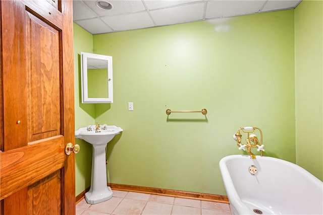 246 Johnston Rd, Bentleyville, PA 15314 - bathroom with a freestanding bath, a paneled ceiling, and tile patterned floors