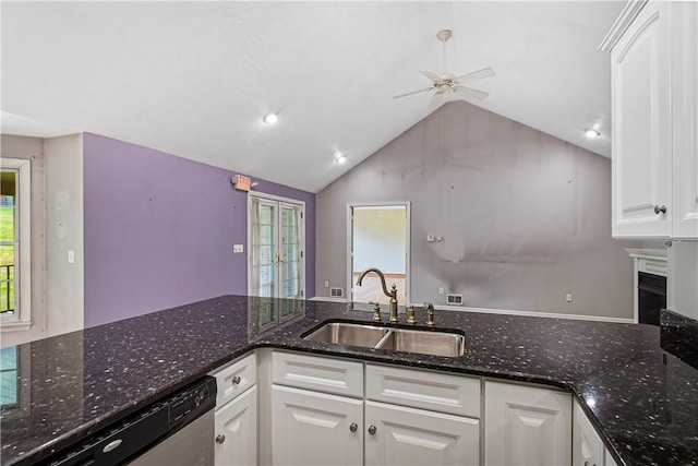 246 Johnston Rd, Bentleyville, PA 15314 - kitchen featuring a ceiling fan, stainless steel dishwasher, plenty of natural light, white cabinets, and lofted ceiling