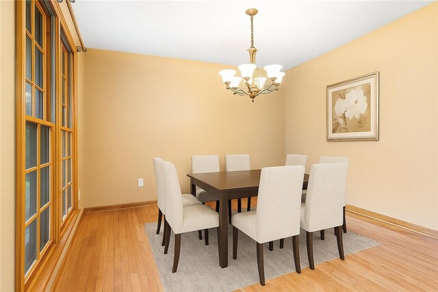 246 Johnston Rd, Bentleyville, PA 15314 - dining room featuring a chandelier and light wood-style floors