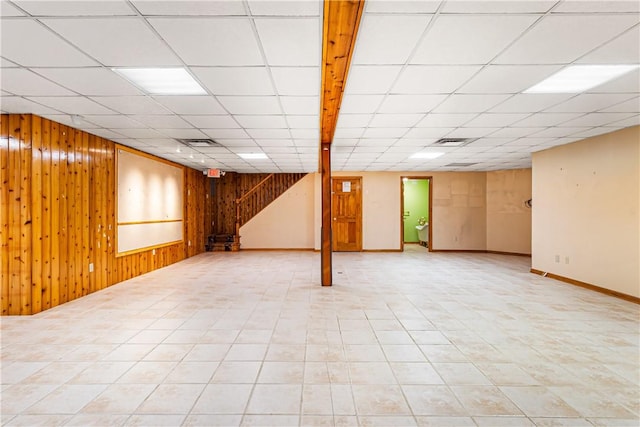 246 Johnston Rd, Bentleyville, PA 15314 - finished below grade area featuring wood walls, a paneled ceiling, and stairs
