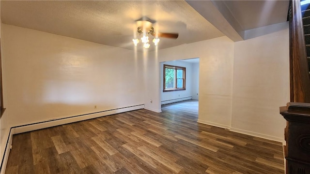 1008 Wallace St, Vandergrift Wml, PA 15690 - unfurnished room featuring baseboard heating, dark wood-type flooring, and a ceiling fan
