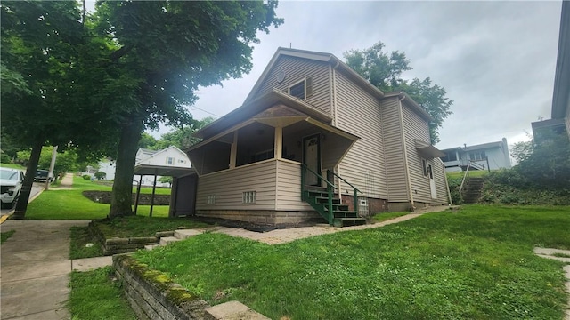 1008 Wallace St, Vandergrift Wml, PA 15690 - view of front facade featuring a front lawn and covered porch