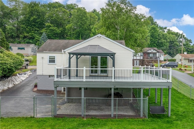 1072 Aetna Dr, Wayne Twp Law, PA 16117 - rear view of house with a gate, a wooden deck, and a shingled roof
