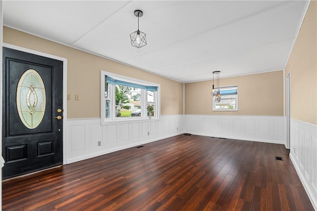 1072 Aetna Dr, Wayne Twp Law, PA 16117 - foyer entrance featuring healthy amount of natural light, a wainscoted wall, and dark wood-style flooring