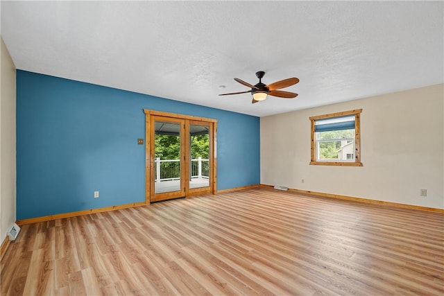 1072 Aetna Dr, Wayne Twp Law, PA 16117 - unfurnished room featuring wood finished floors, ceiling fan, and a textured ceiling