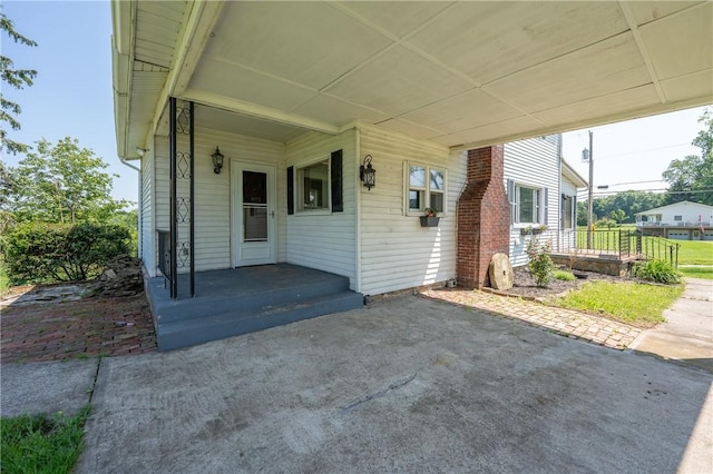 4177 Main St, Cook Twp, PA 15687 - covered porch featuring an attached carport
