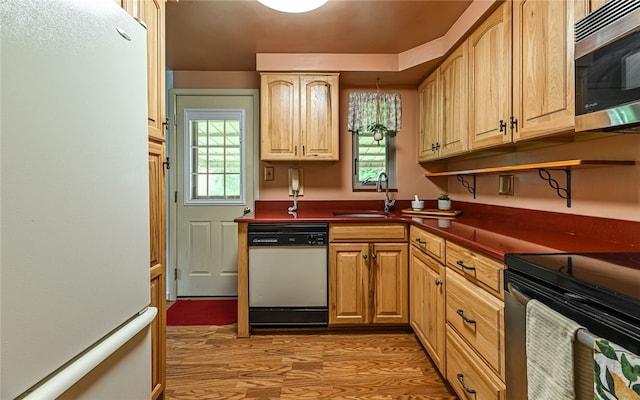 105 Hilltop Cir, Shaler, PA 15116 - kitchen featuring appliances with stainless steel finishes, light wood-type flooring, and dark countertops