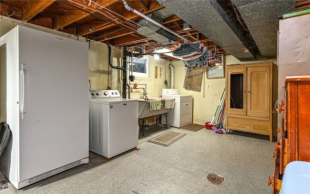 105 Hilltop Cir, Shaler, PA 15116 - below grade area featuring washer and clothes dryer, light flooring, and freestanding refrigerator
