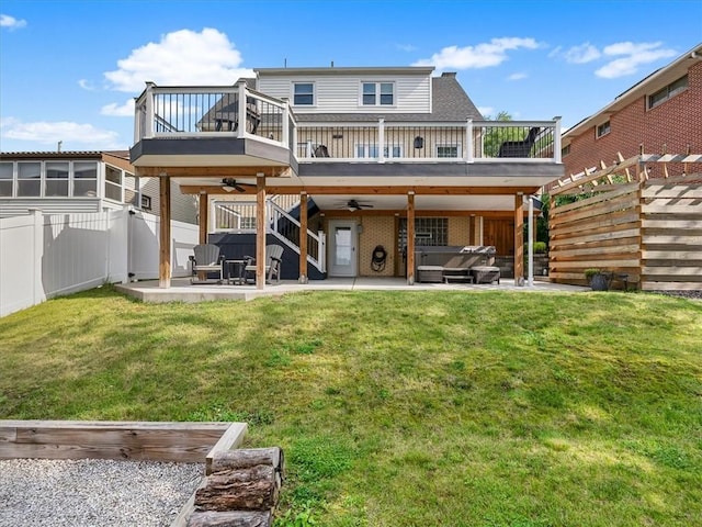 1713 Buchanan Ext, Aliquippa, PA 15001 - rear view of house featuring a hot tub, ceiling fan, a patio area, a fenced backyard, and a balcony
