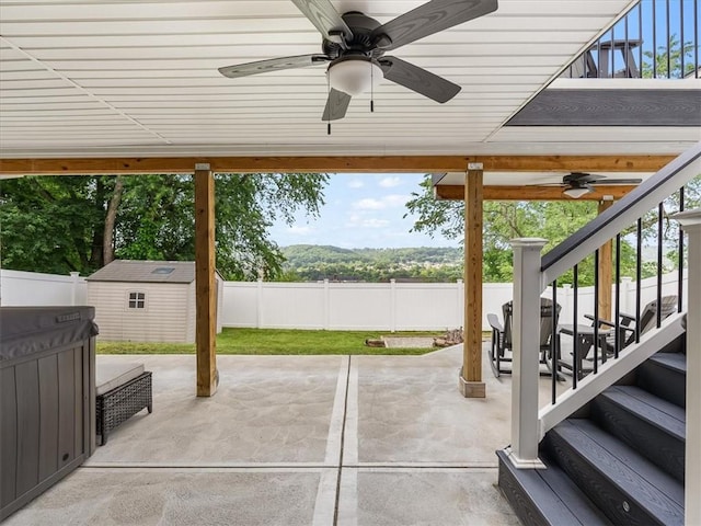 1713 Buchanan Ext, Aliquippa, PA 15001 - fenced backyard with a ceiling fan, a patio, and a storage shed