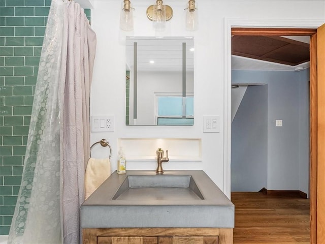 1713 Buchanan Ext, Aliquippa, PA 15001 - bathroom featuring wood finished floors, a tile shower, and vanity