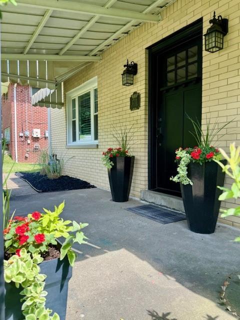 1713 Buchanan Ext, Aliquippa, PA 15001 - view of exterior entry featuring brick siding