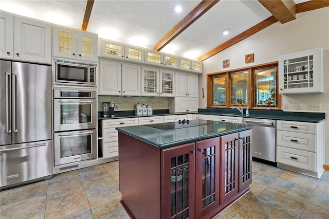 2370 Morrow Rd, Upper St Clair, PA 15241 - kitchen featuring stainless steel appliances, stone tile flooring, tasteful backsplash, glass insert cabinets, and white cabinets
