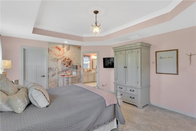 205 Regency Dr, North Strabane, PA 15330 - bedroom featuring a tray ceiling, light carpet, a chandelier, and connected bathroom