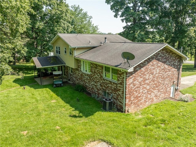 756 Arona Rd, Hempfield Twp Wml, PA 15672 - back of house with a yard, brick siding, and roof with shingles