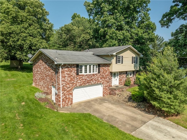 756 Arona Rd, Hempfield Twp Wml, PA 15672 - tri-level home with concrete driveway, a garage, a front lawn, brick siding, and a shingled roof