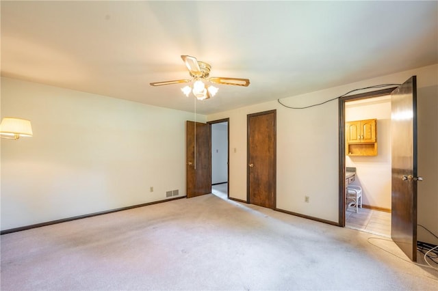 756 Arona Rd, Hempfield Twp Wml, PA 15672 - unfurnished bedroom featuring light colored carpet and a ceiling fan
