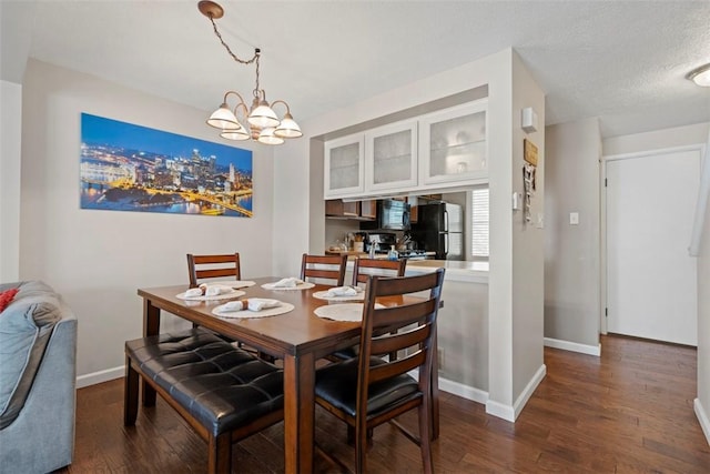 410 Redrome Cir E, South Fayette, PA 15017 - dining area with dark wood-type flooring and a chandelier