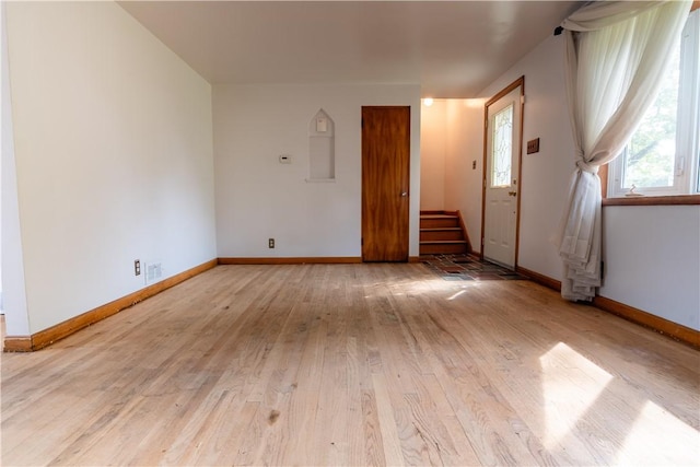 2429 Rose Garden Rd, Banksville/Westwood, PA 15220 - empty room with light wood finished floors and stairway
