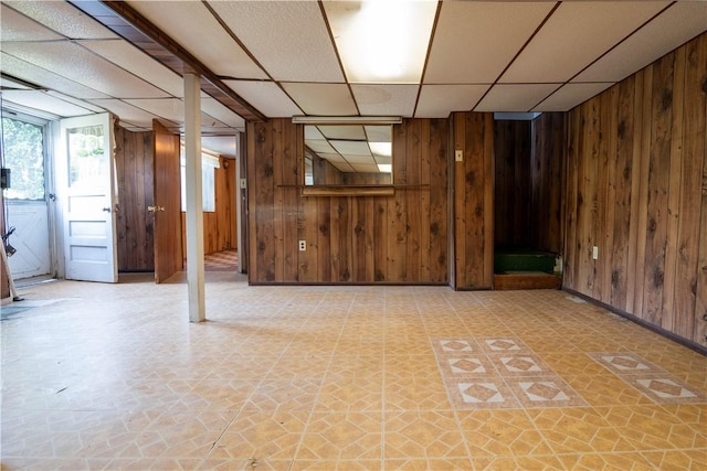 2429 Rose Garden Rd, Banksville/Westwood, PA 15220 - basement featuring wood walls, a paneled ceiling, and light flooring