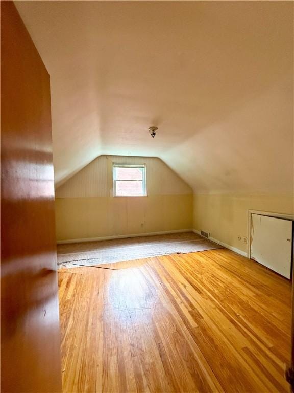 1320 Main St, Bridgeville, PA 15017 - additional living space featuring vaulted ceiling and wood finished floors