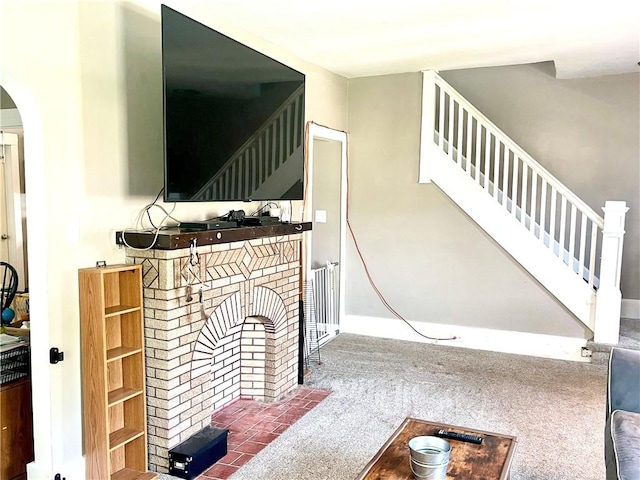424 Hess Ave, Erie City, PA 16507 - living room with stairs, arched walkways, and carpet flooring