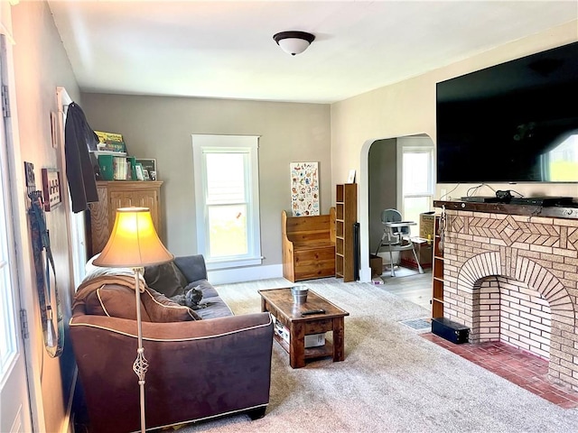 424 Hess Ave, Erie City, PA 16507 - living area with a fireplace and arched walkways