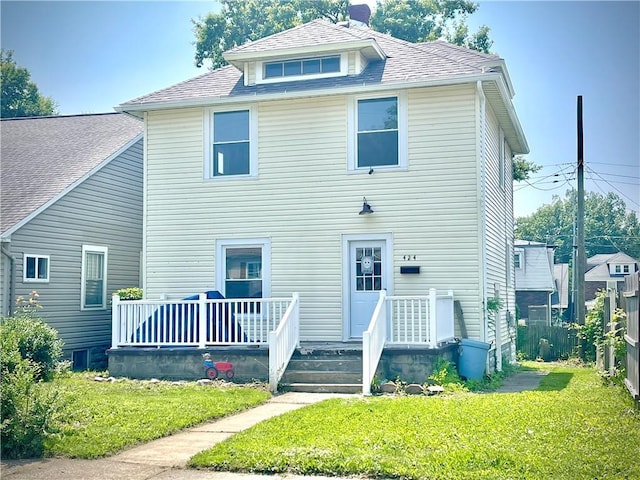 424 Hess Ave, Erie City, PA 16507 - rear view of house featuring a yard and roof with shingles