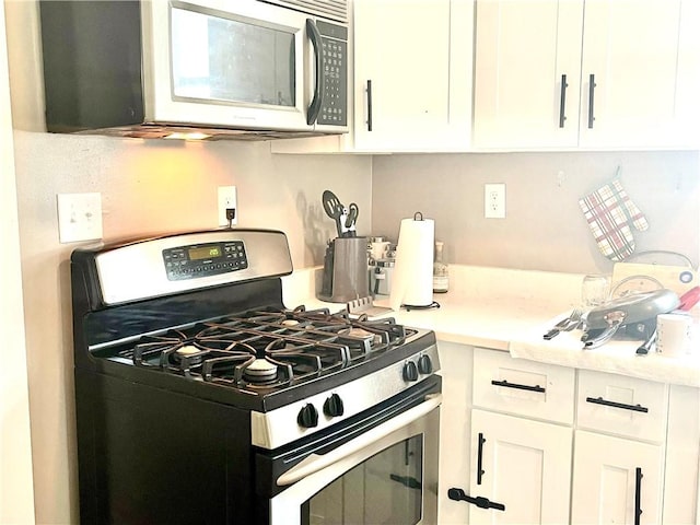 424 Hess Ave, Erie City, PA 16507 - kitchen featuring appliances with stainless steel finishes, white cabinetry, and light countertops