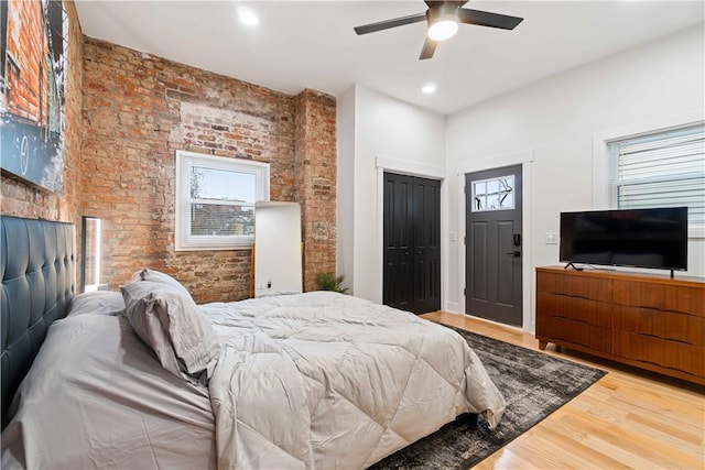 161 Morewood, Oakland, PA 15213 - bedroom with wood finished floors, multiple windows, brick wall, ceiling fan, and recessed lighting